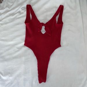 Red thong bodysuit